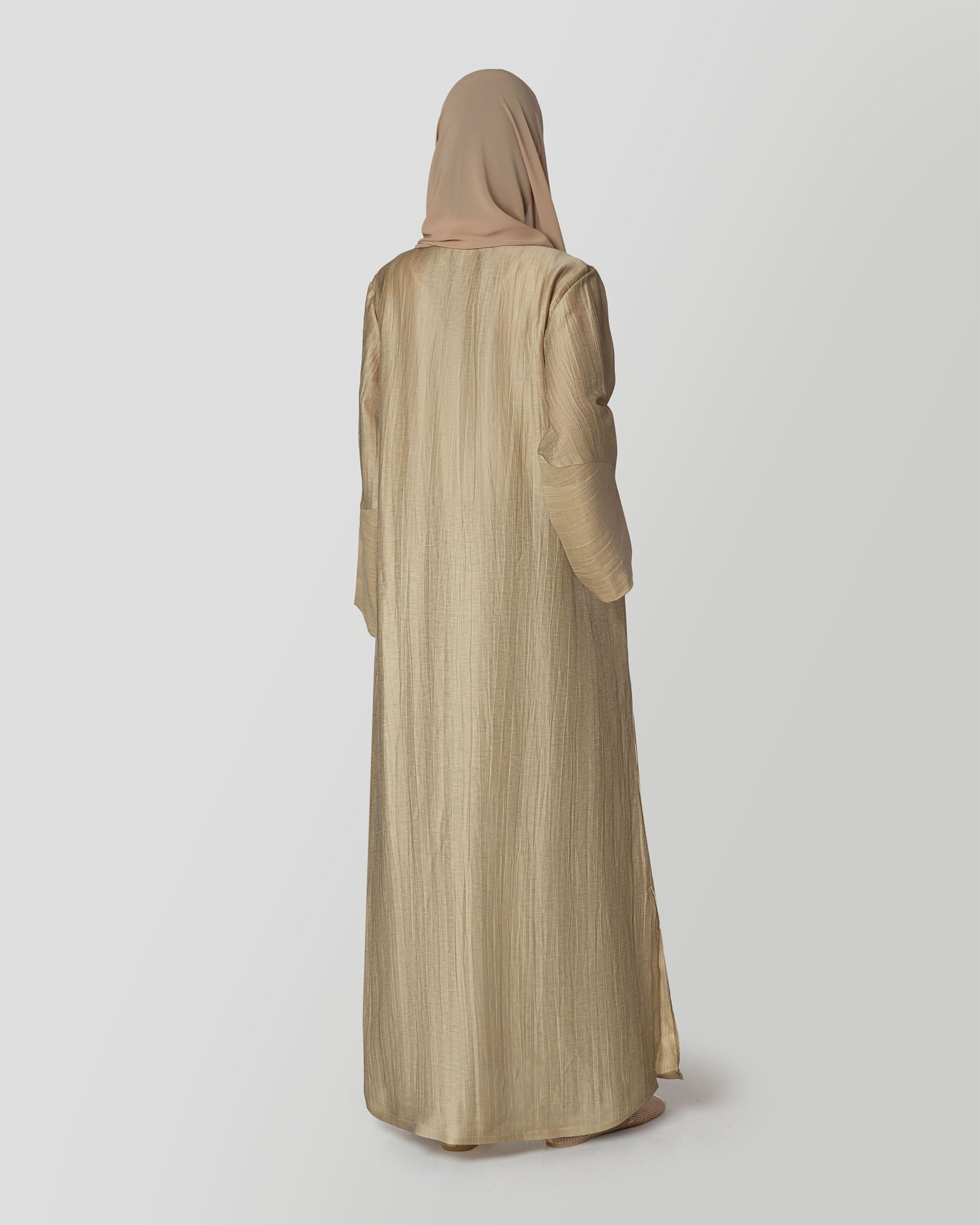 Lily Abaya in Gold